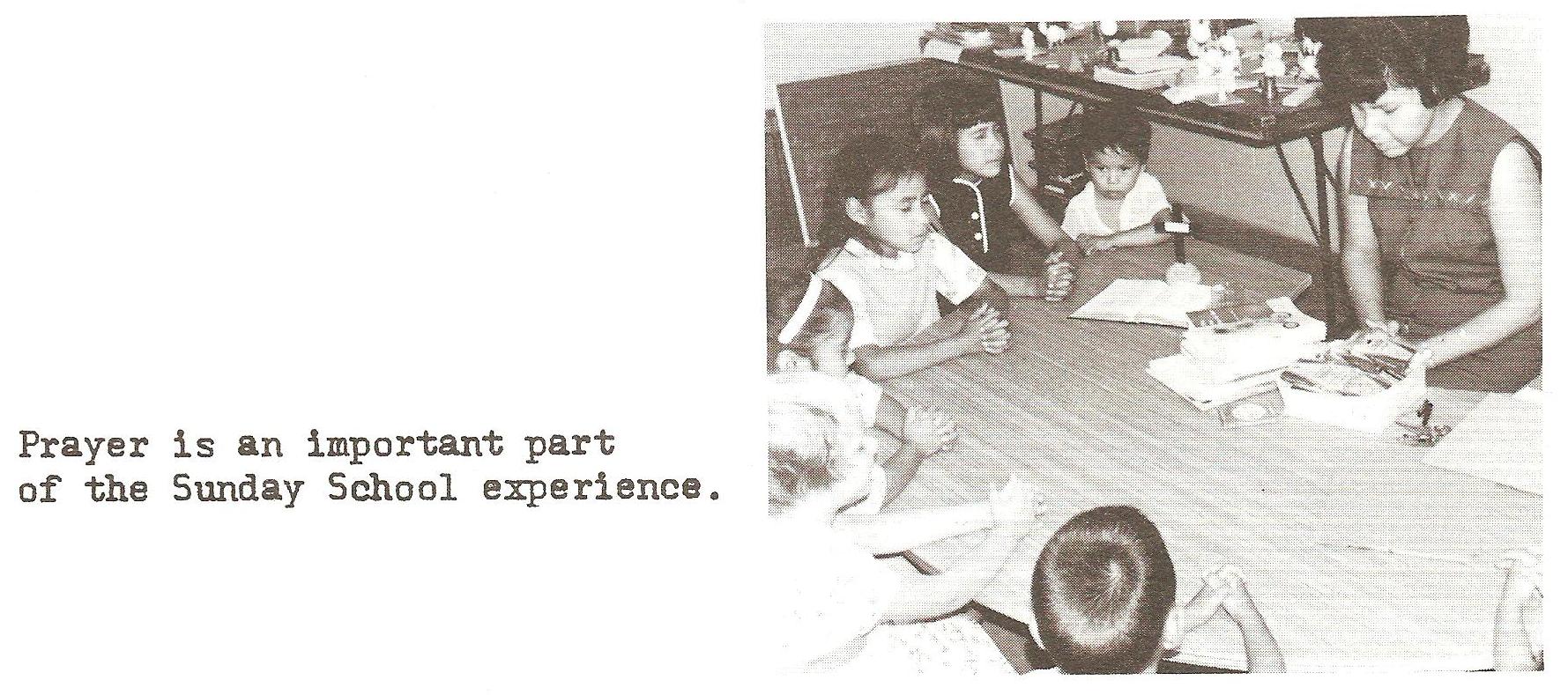 Children praying in Sunday school